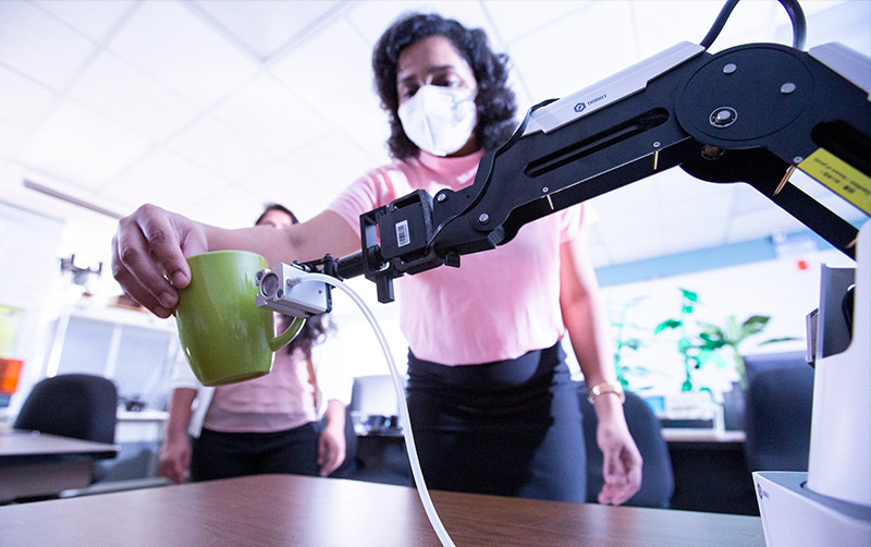 Ruchi Ramesh Bagwe works with Robotic Arm