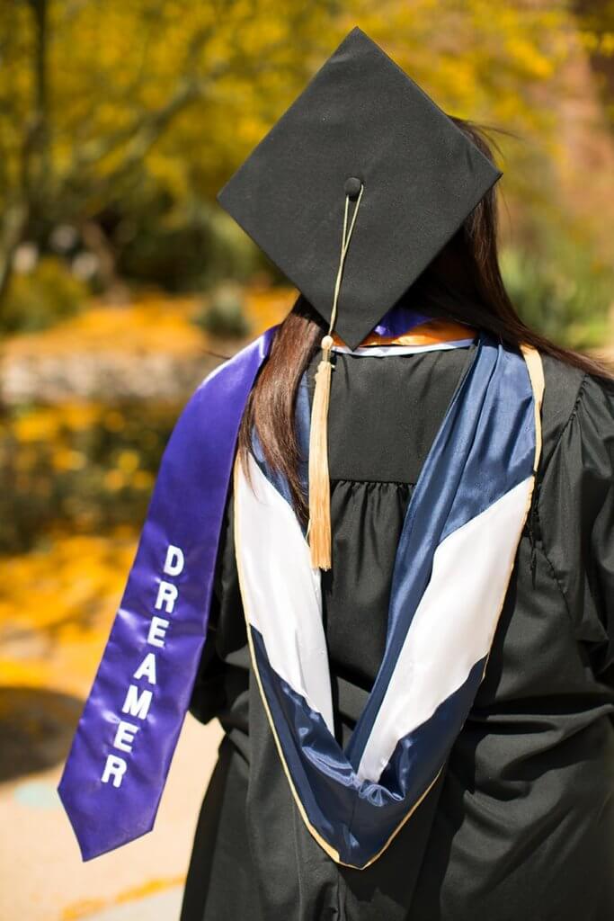 "Dreamers" on Commencement Regalia