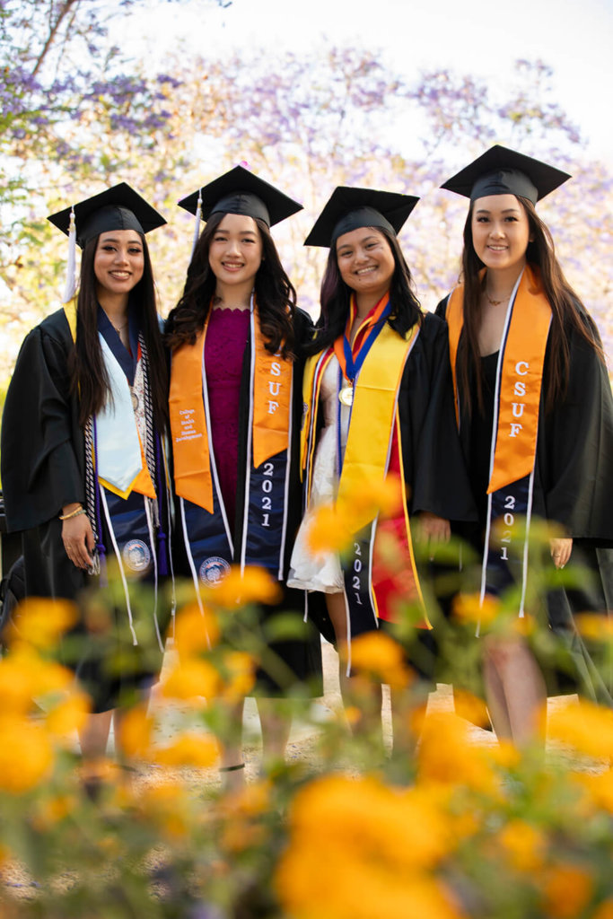 Graduates pose for photo