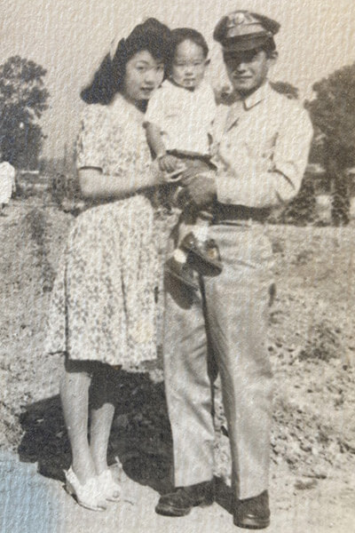 Young Craig Ihara and parents in vintage photo.