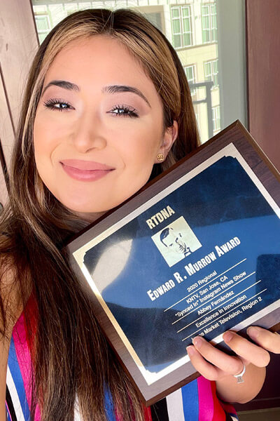 Abbey Fernández with Edward Murrow Award