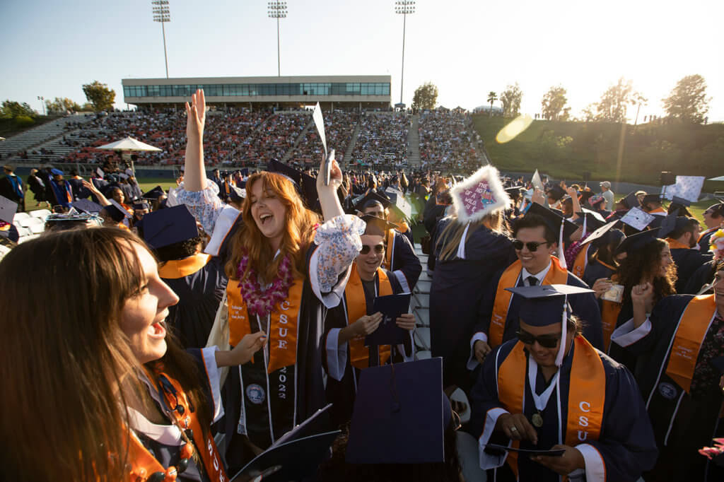 Crowd of graduates celebrate