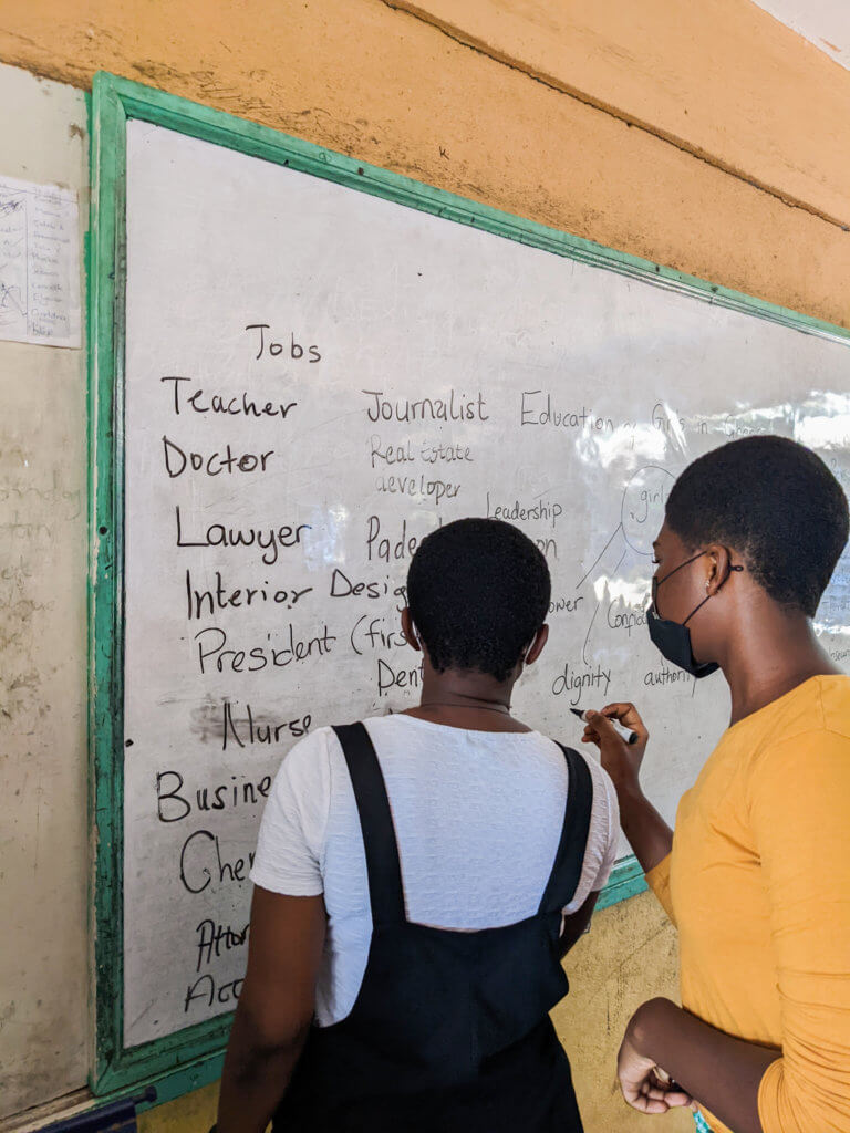 Fulbright scholar Abigail Amoako Kayser works with student in Ghana