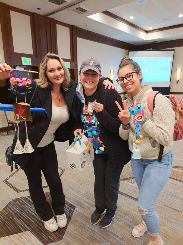 Rebecca Sapien and classmates with puppets