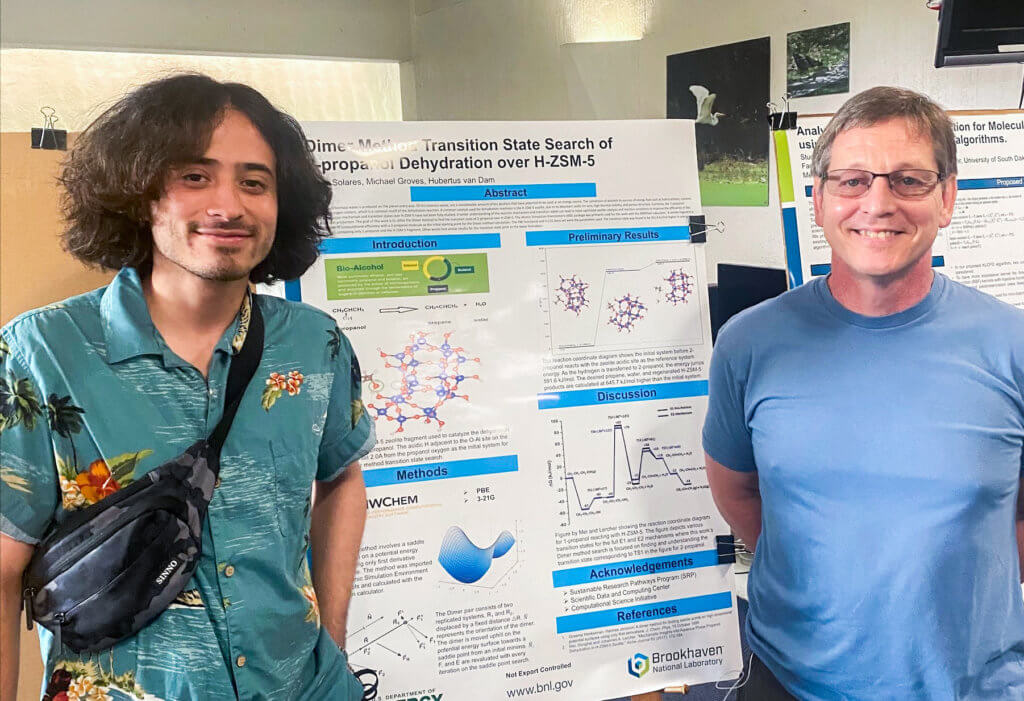 Chemistry student Oliver Solares and Hubertus van Dam from Brookhaven National Laboratory study energy solutions 