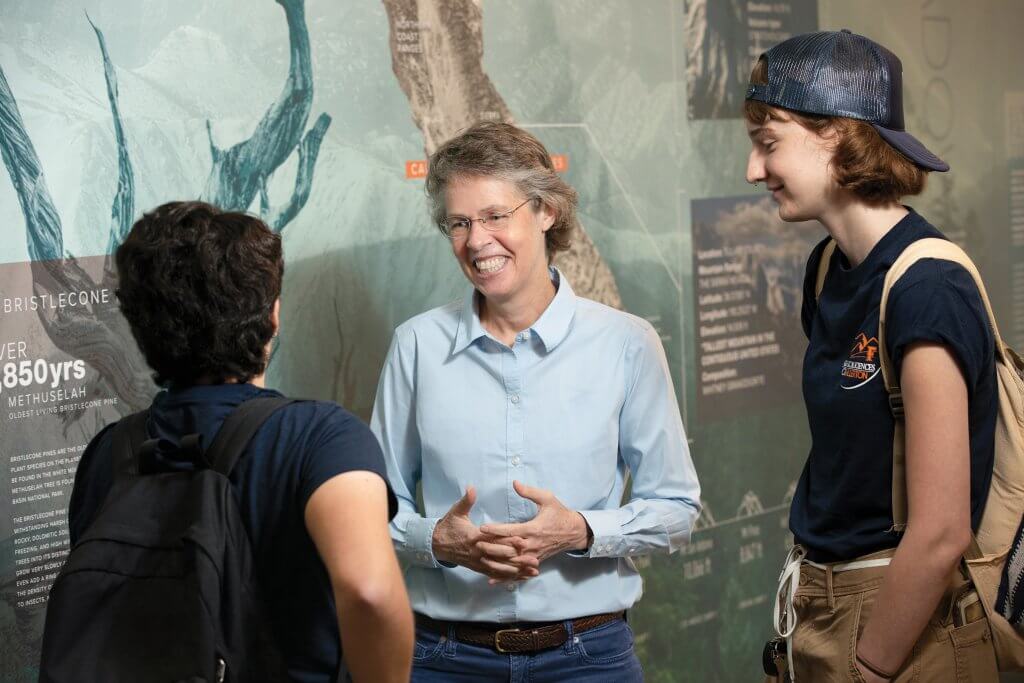 Dean Marie Johnson with students