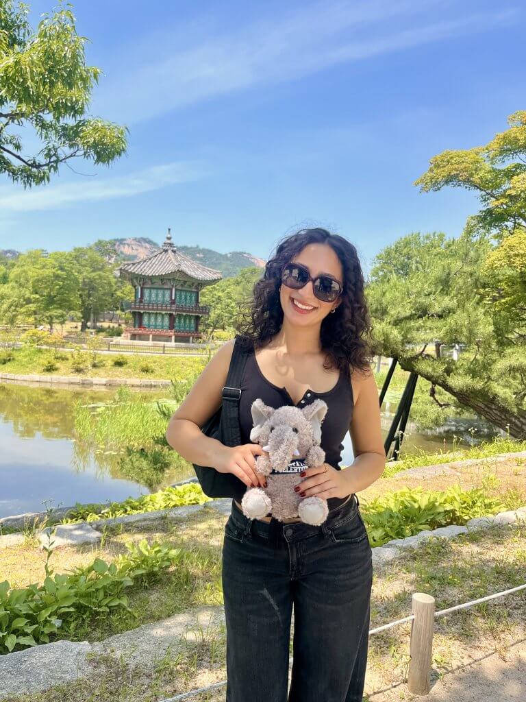 Sophia Darvish in Korea holds a Tuffy Titan plush.