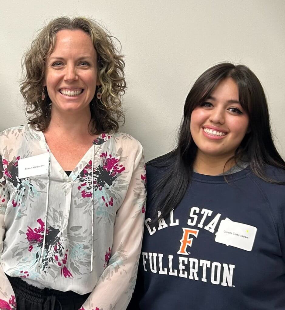 Dr. Alison Marzocchi and student Giselle Cortez-Tlaxcuapan are working on the AI project