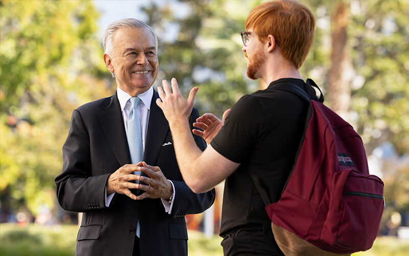 Alum Raúl Tapia with student Colson Houck Teal