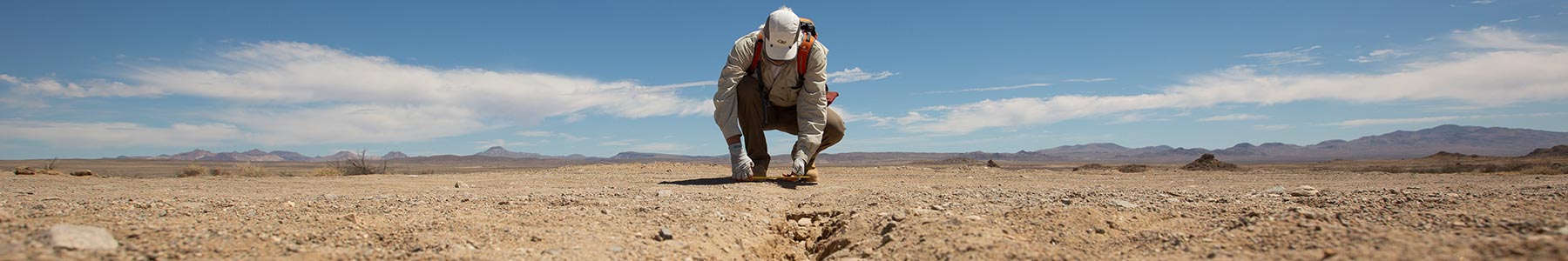 Sinan Akçiz measures a surface ruptire from the Ridgecrest earthquakes