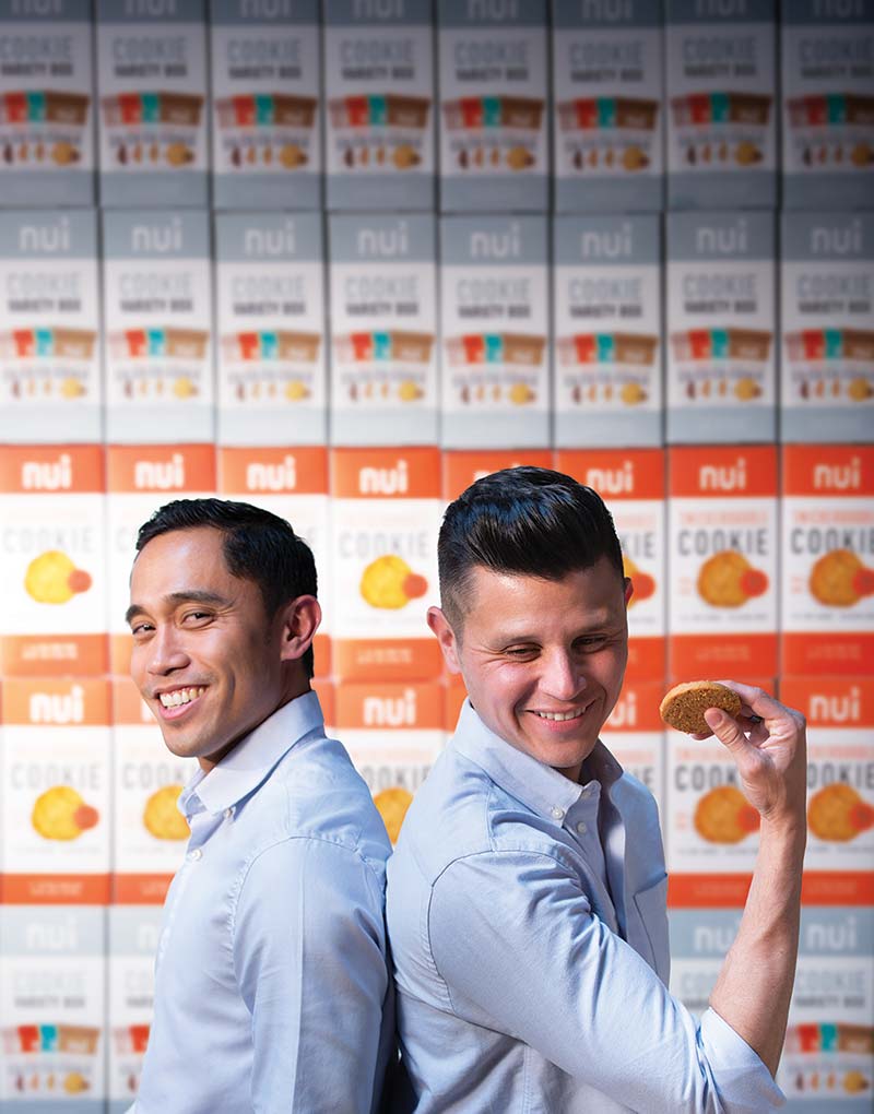 Victor Macias and Kristoffer Quiaoit pose with their Nui cookies