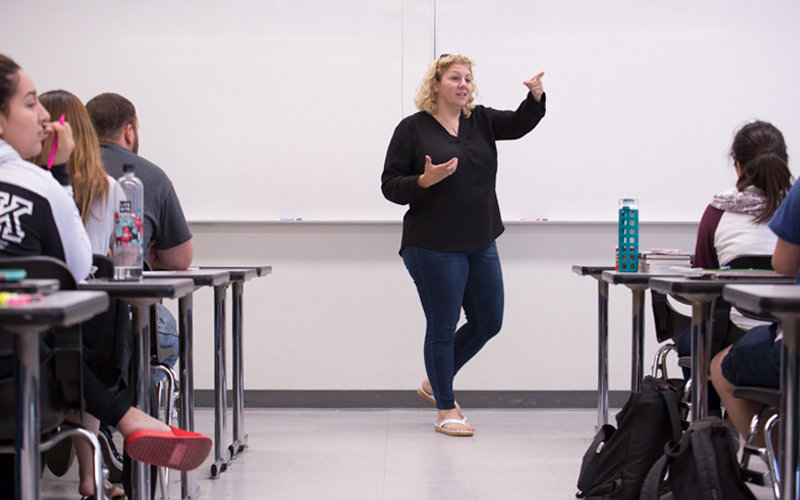 Alissa Ackerman teaching in classroom