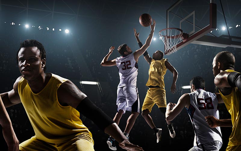 Basketball players in action on the court.