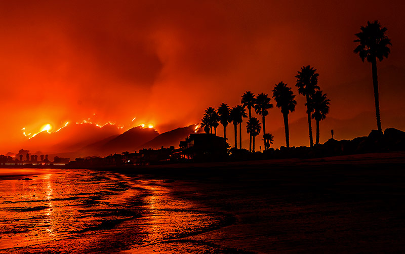 Santa Barbara fires rage next to the coast.