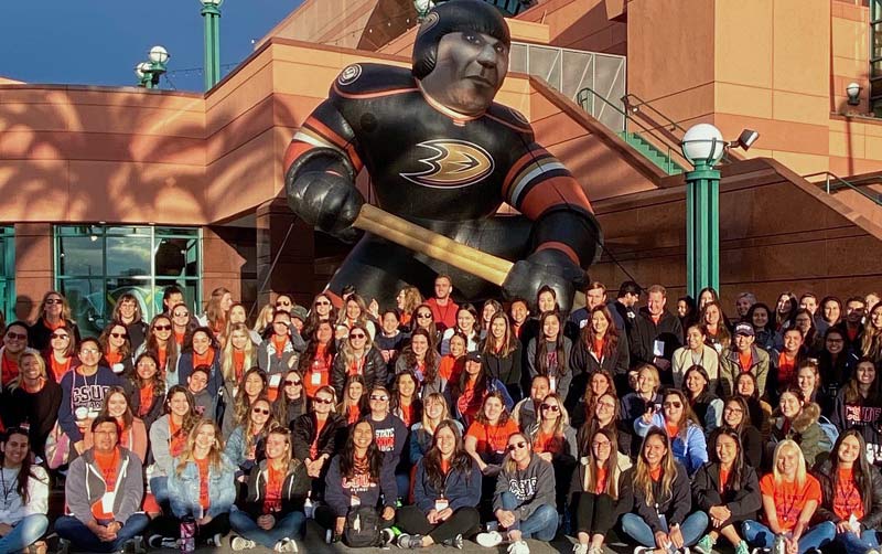 CSUF teacher candidates work with children at Anaheim Ducks' field trip for elementary students..