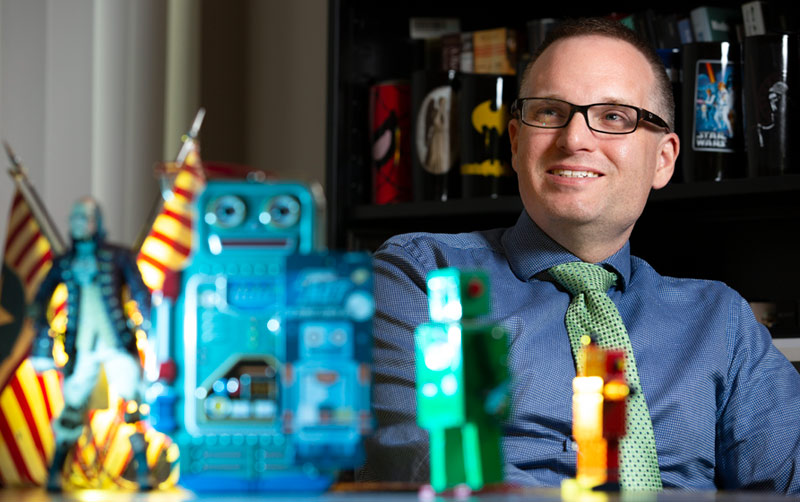 Robotic researcher Dustin Abnet with robots.