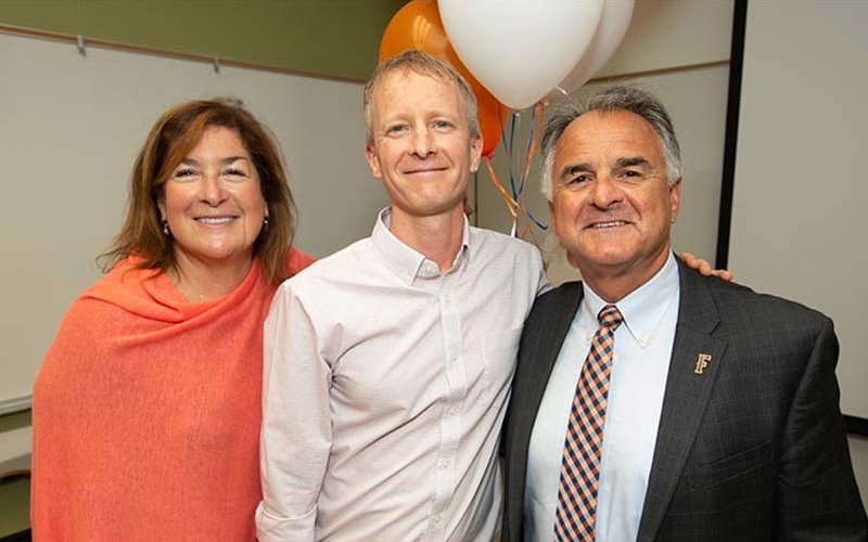 Professor Matt Englar-Carlson with President Virjee & Julie Virjee