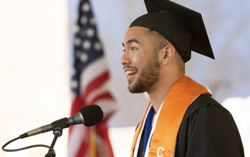Erick Auginaldo speaking at commencement.