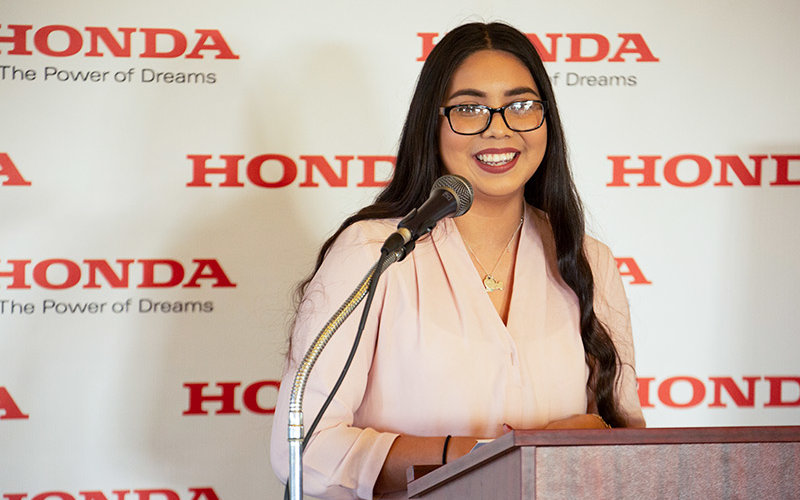 Jaylene Mendoza speaks at the Hispanic Golf Tournament.