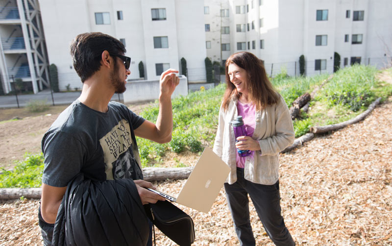 Sara Johnson working with student