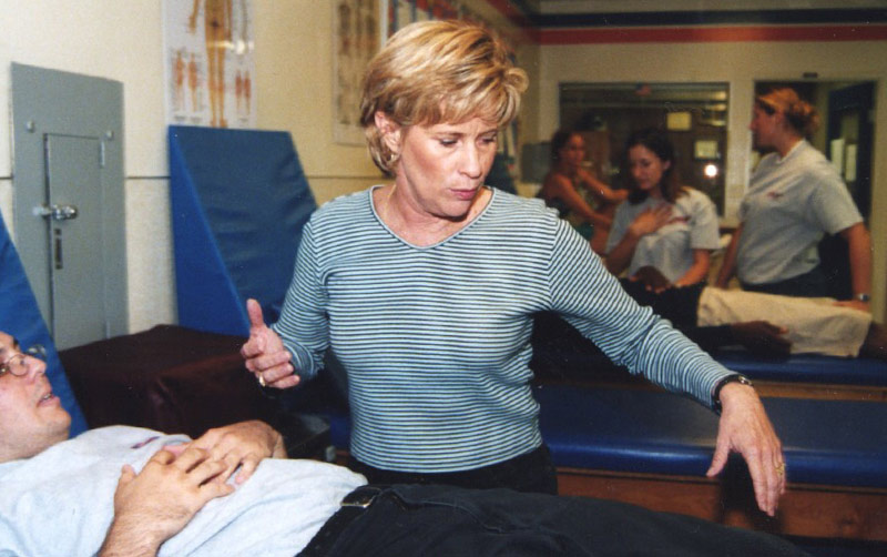 Julie Max working with student.