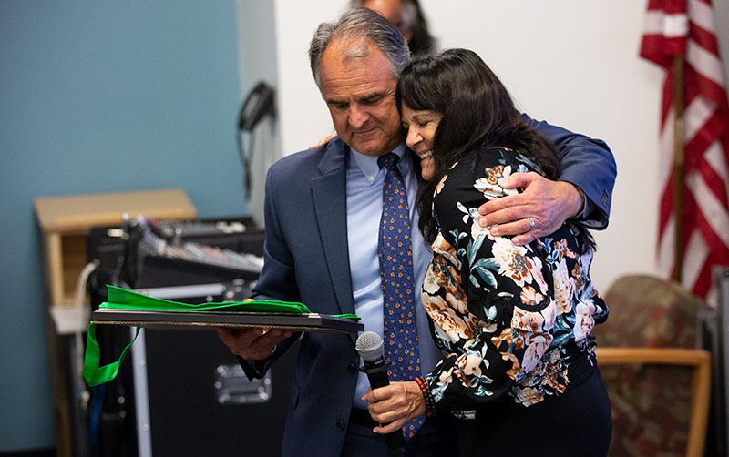 Kristi Kanel with President Virjee.