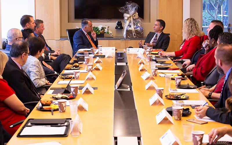 CSUF and Fullerton City leadership around table.