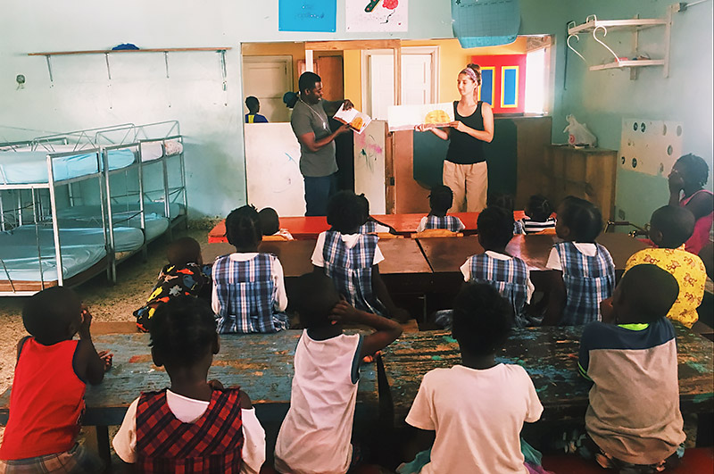 Lindsey Haas teaching in a Haitian classroom.