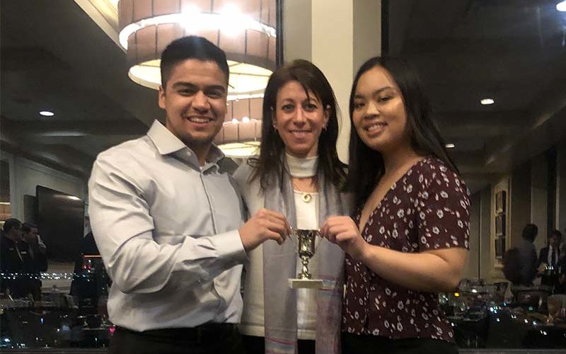 Moot Court students pose with trophy