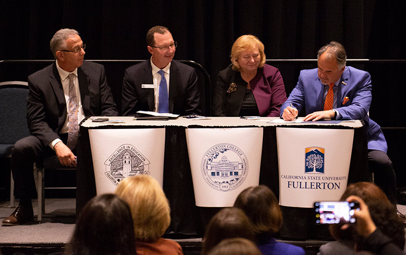 Educational Partners sign agreement.