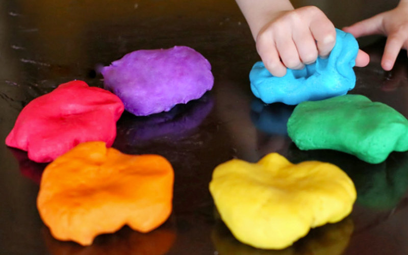 Different piles of Play Doh clay.