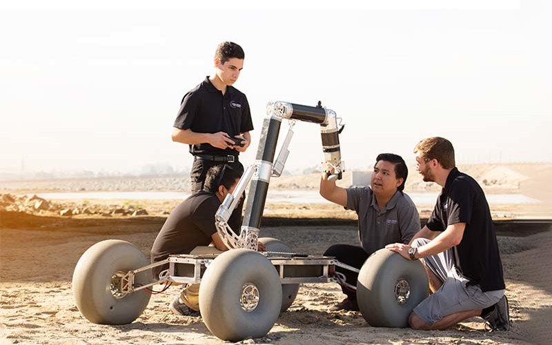 Engineering students working on Rover.