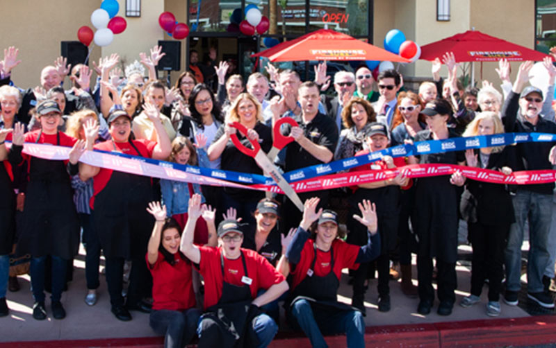 People celebrate grand opening.