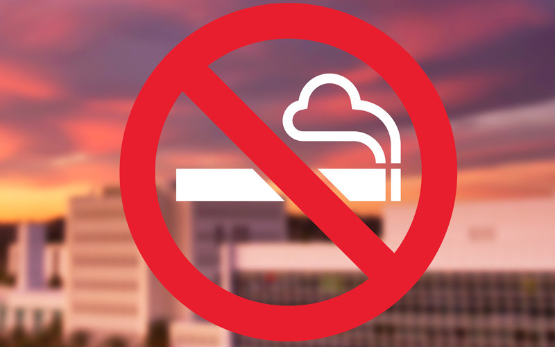 Smoking Ban illustration over campus.