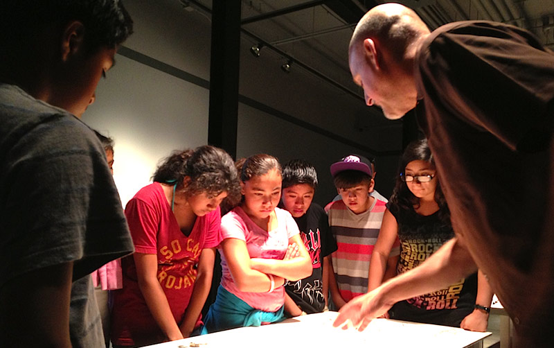 John Spiak meets with visitors.