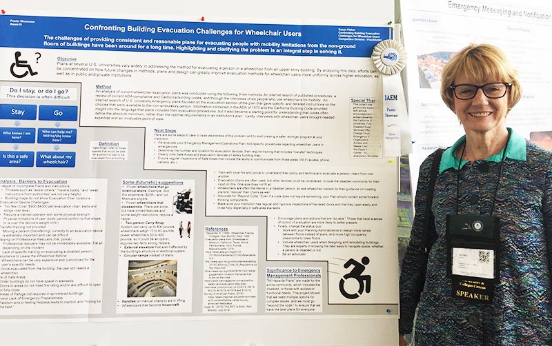 Sue Fisher with Poster presentation board