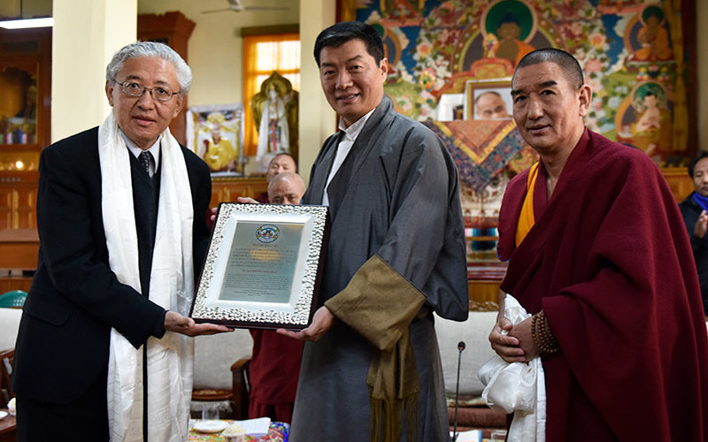 President Dr Lobsang Sangay presenting the Three Wheel Recognition Award to Dr Tenzin Dorjee, Chair, US Commission on International Religious Freedom (USCIRF) organised by Institute of Buddhist Dialectic and Sarah College for Higher Tibetan Studies.