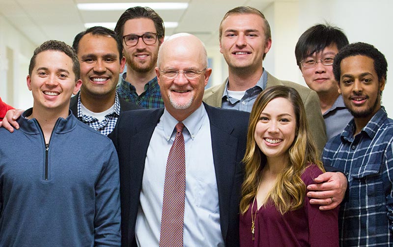 Jeffrey Van Harte with students