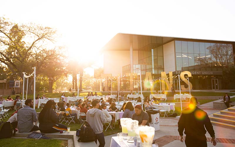 The campus community fills Becker Amphitheater to celebrate the Titan Dreamers Resource Center’s fifth anniversary.
