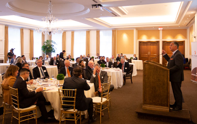 Virjee speaks at OC Forum.
