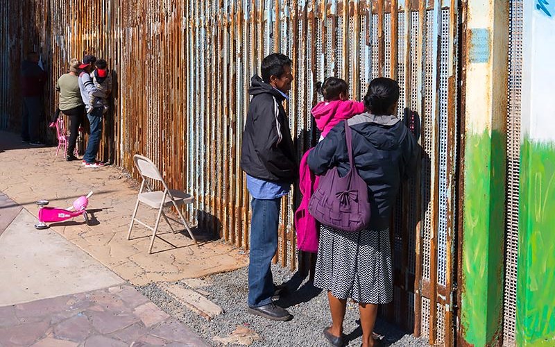 Family at border wall