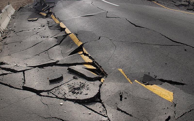 cracked asphalt after earthquake