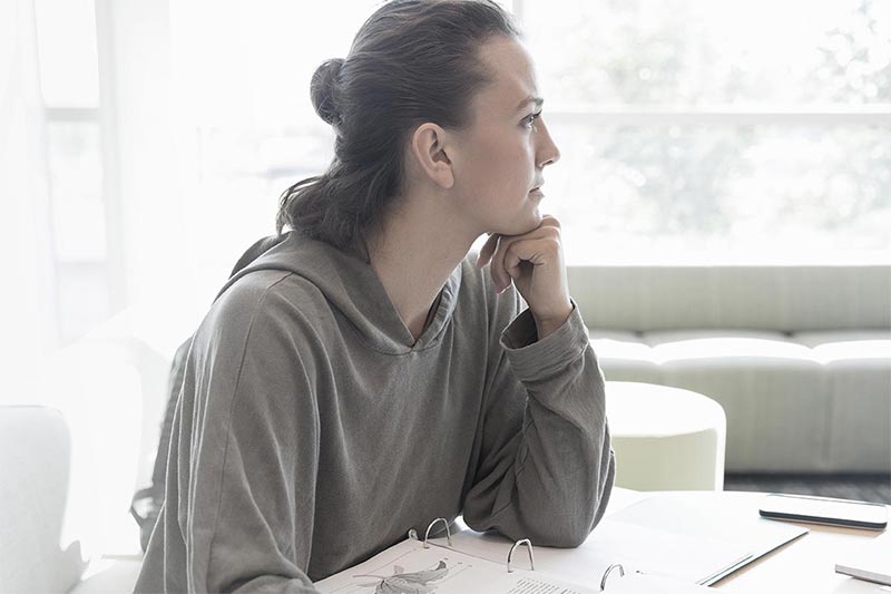Student in deep thought