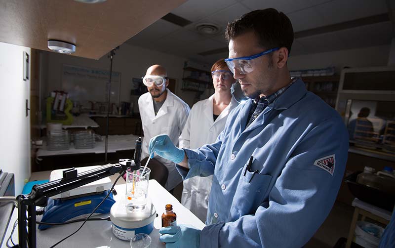 CSUF Staff & Faculty in lab