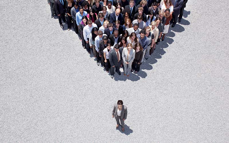 Woman leading group of business people