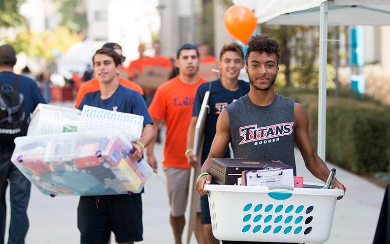 Students moving into on-campus housing.