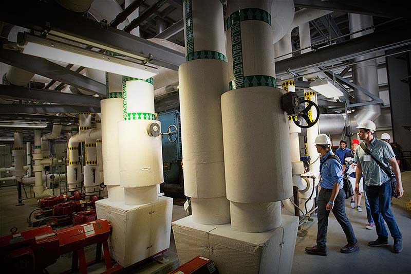 Attendees are shown around the energy saving Tri-Generation Power Plant