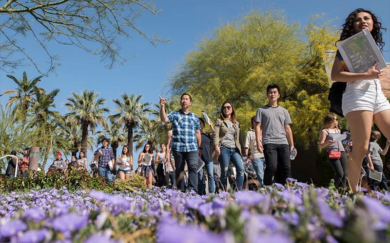 Parents and students walking on campus during Welcome to CSUF Day