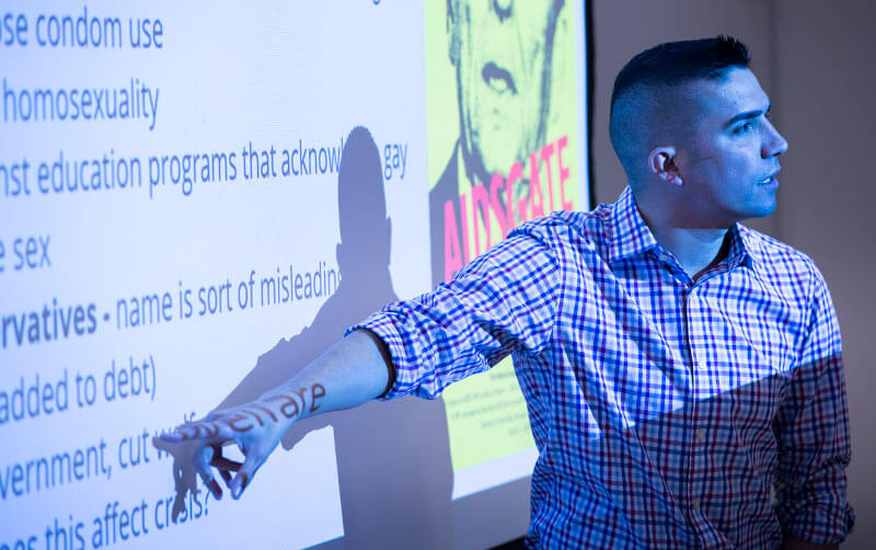 Eric Gonzaba lectures in classroom