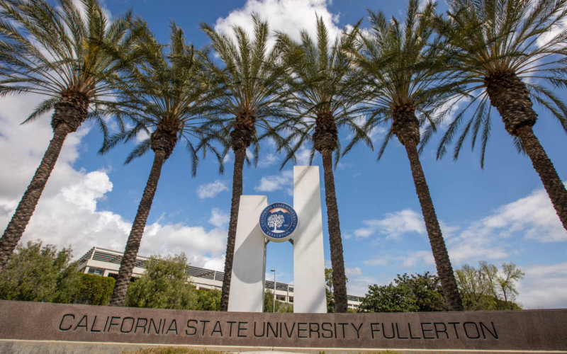 CSUF Seal in front of palm trees